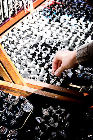 Silver jewelery: chains, rings, medallion and earrings.の写真素材