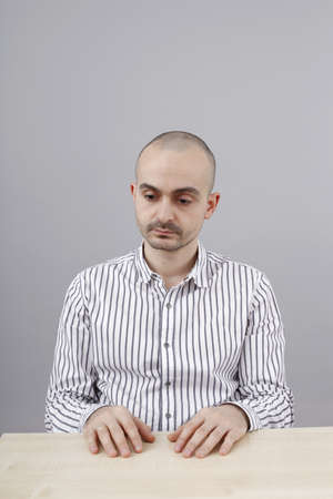 Young businessman at his deskの写真素材