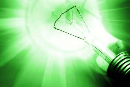 Background with lit lightbulb. Modern look.の写真素材