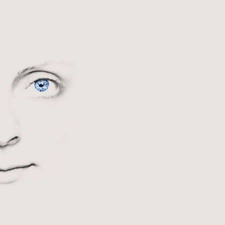 Close-up of a beautiful girl's face with incredible eyesの写真素材