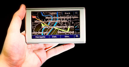 Gps in a man hand. Find your way !の写真素材