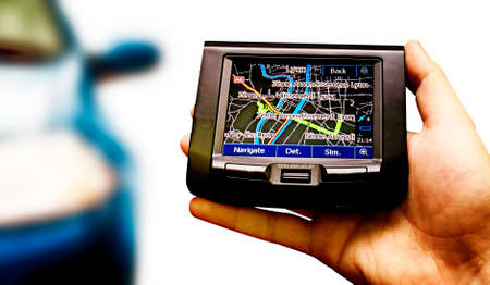 Gps in a man hand. Find your way !の写真素材