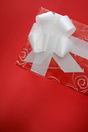 Present box isolated on red background.の写真素材