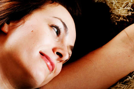 Beautiful happy woman with green eyes.の写真素材