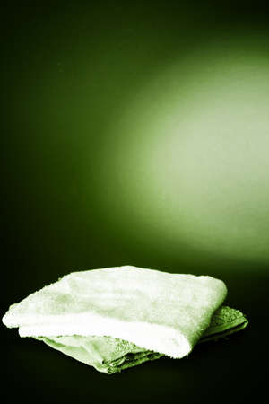 Towels isolated on red backgroundの写真素材