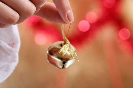 Close-up of yellow christmas ringer.の写真素材