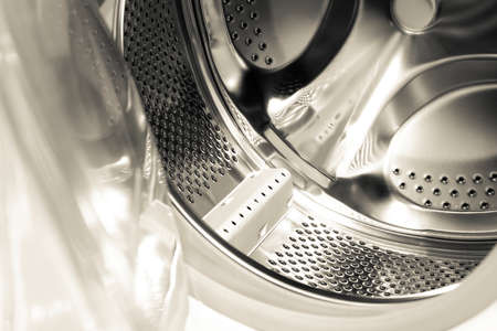 close up photo of a white, new washing machineの写真素材