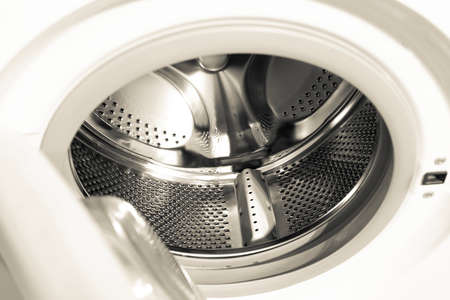 close up photo of a white, new washing machineの写真素材
