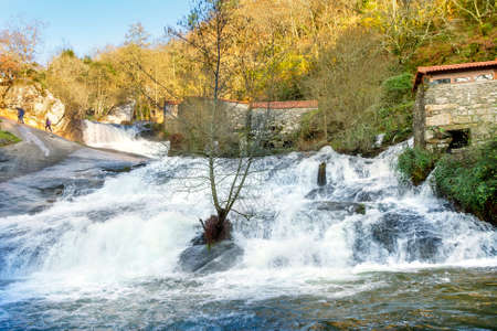 Waterfall and watermills of Barosa river in Barro townの写真素材