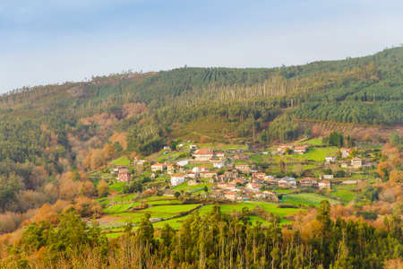 Village surrounding by forests on Suido mountain range between Pontevedra and Ourense provincesの写真素材