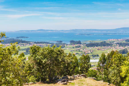 Arousa estuary and Salnes valley from San Cibran viewpoint in Cobas village, Meanho townの写真素材