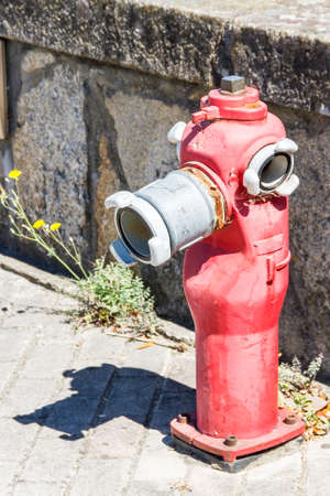 Red fire hydrant on a city street