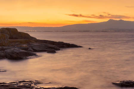 Golden dusk in Arousa estuary from Arousa Islandの写真素材