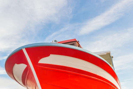 Red boat bow for mussel aquaculture in Arousa Islandの写真素材