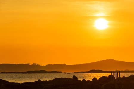 Three islands of Arousa Bay at sunset: Arousa, Areoso and Ruaの写真素材