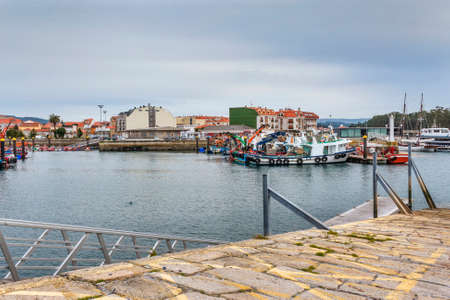 Moored boats on Vilanova de Arousa fishing harborの写真素材