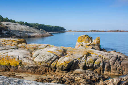 Granite coastal rocks in Arousa Island coastlineの写真素材