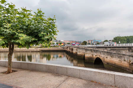 Roman bridge between O Temple and O Burgo cities, over O Burgo estuaryの写真素材