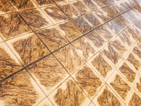 Brown floor tiles background and textureの写真素材