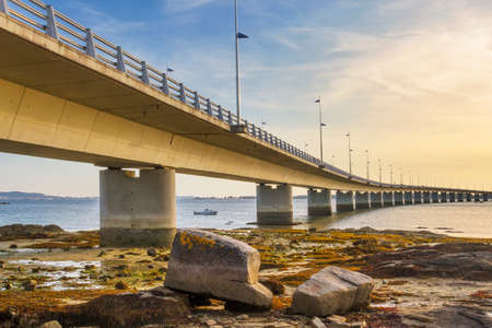 Arousa Island bridge at low tide from Vilanova de Arousaの写真素材