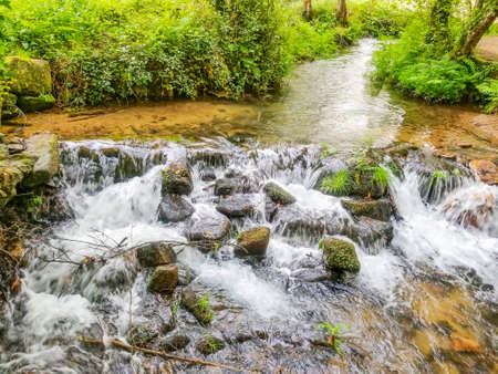 Fast and stones of Armenteira river on the stone and water route in Meis townの写真素材