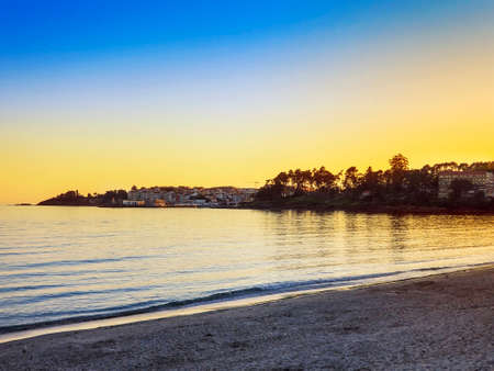 Portonovo village at dusk from Silgar beach in Sanxenxo tourist cityの写真素材
