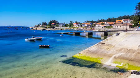 Wooden dock and ramp on Campo fishing harbor in Arousa Island