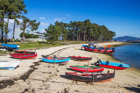 Beached fishing boats on Furado beach, Arousa Island, Galicia, Spainの写真素材