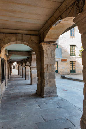 Historic street with arcades in Pontevedra cityの写真素材