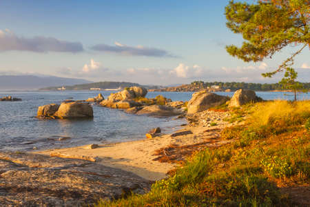 Small beach with coastal rocks in Carreiron natural park, Arousa Island, Galicia, Spainの写真素材