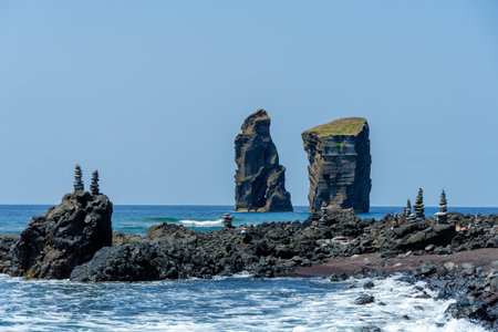 Mosteiros beach on the island of Sao Miguel in the Azores. Rock formation in coastline landscape on sunny day.の写真素材