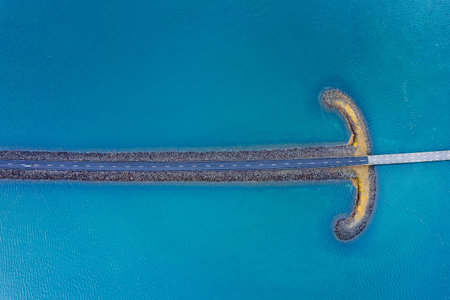 Icelant, travel destination in Europe. Vertical aerial view by drone. Screen saver background abstract pattern of Sword Bridge. Beautiful lines and colors.の写真素材