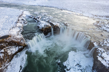 Skyview of Godafoss (GoÃ°afoss) waterfall. It is one of the spectacular waterfalls in Iceland. Winter landscape. SkjÃ¡lfandafljÃ³t River. Aerial photography captured by drone.の写真素材