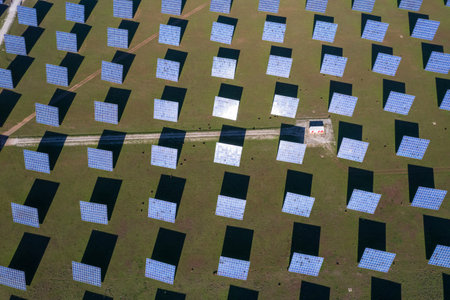 Aerial view of solar panels stretching across Alentejo,Portugal. Sustainable resource concept capturing renewable energy. Photovoltaic power generation, green energy.の写真素材