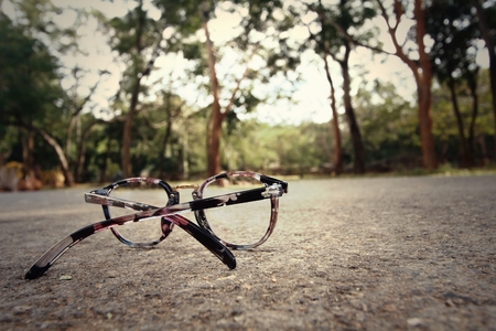 Pair of glasses on the streetの写真素材