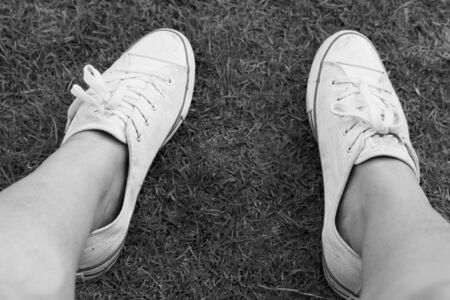 sneakers are on green grassの写真素材