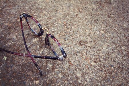 Pair of glasses on the streetの写真素材