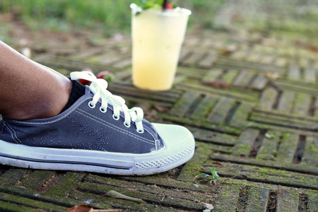 Feet in sneakersの写真素材