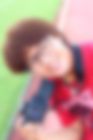 blur young woman photographer taking photoの写真素材
