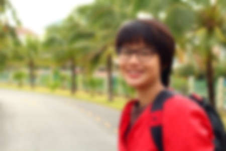 blurred women with backpackの写真素材