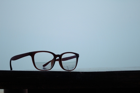 Glasses on a beach chairの写真素材