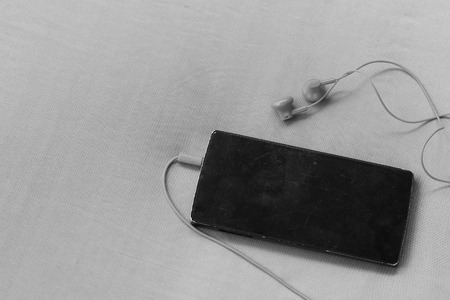 Mobile phone and headphoneの写真素材