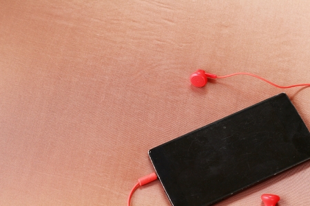 Mobile phone and headphoneの写真素材