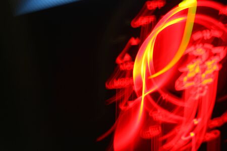 Blurred of car in city at nightの写真素材