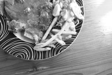 Pork steak and vegetable saladの写真素材