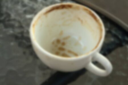 blur espresso cup on wood surface with spaceの写真素材