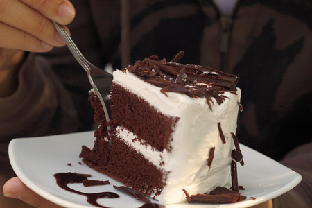 A half eaten Chocolate Cake Black Forest.