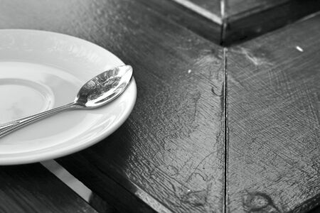 Place setting with plate spoonsの写真素材