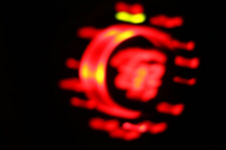 Blurred of car in city at nightの写真素材