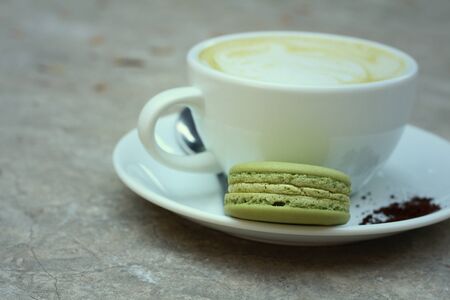 Green tea and milk with macaroon